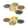 Close-up of some hexagonal boards from the game, with a statue piece on top of one of them