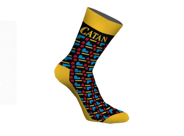 Black and yellow sock with the yellow Catan logo on the top