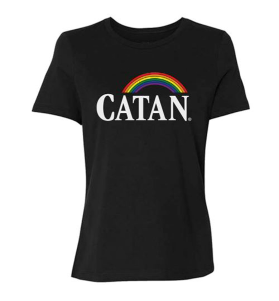 Black t-shirt written Catan in white with a rainbow over it