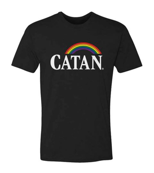 Black t-shirt written Catan in white with a rainbow over it