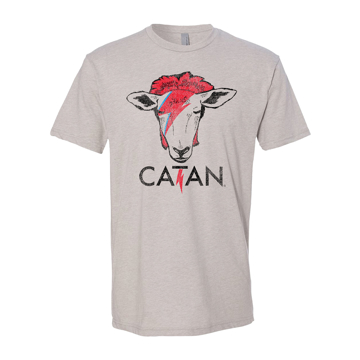 A light-gray t-shirt with a sheep's head with a red lightning painted over it's right-eye, written Catan in black underneath it