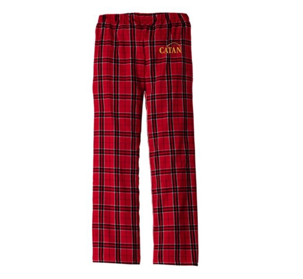 Red pajama pants with blue crossed-stripes, written Catan in yellow on the top of the left leg