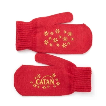 Image of red mittens with yellow Catan logo and snowflakes