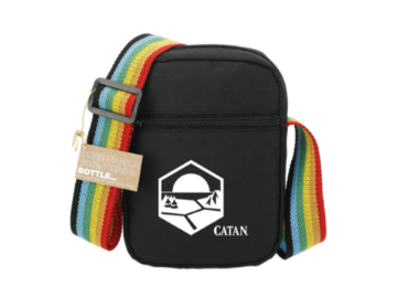 black crossbody bag with rainbow colored stripe strap and Catan logo on front pocket